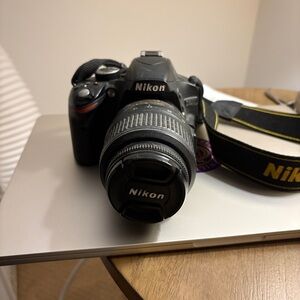 Nikon Black DSLR 3200 Camera with Black & Yellow Strap